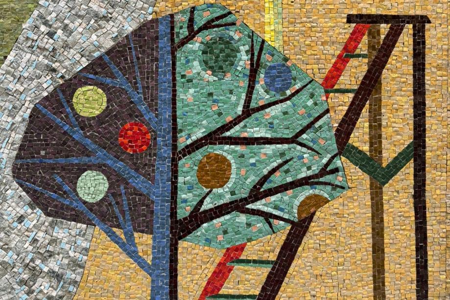 A colorful glass and stone mosaic depicting a tree and a ladder.