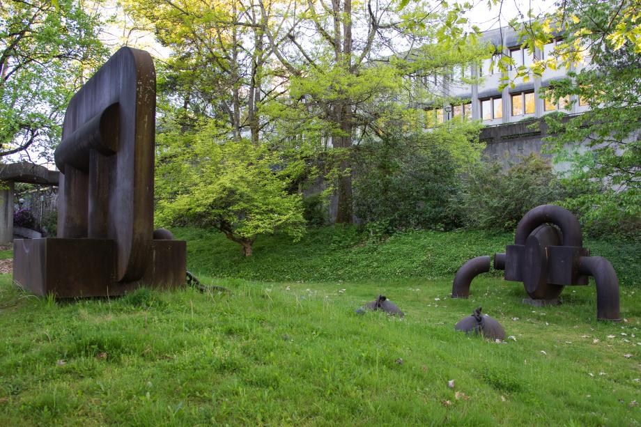 A wide shot of the entire Boiler Works statue with the Transportation building in the background. 