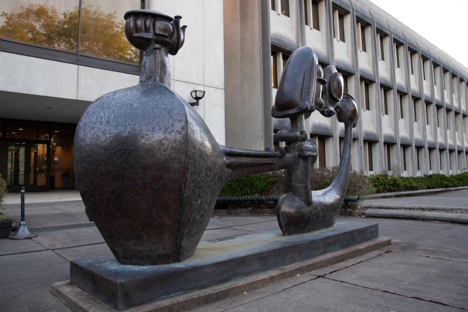 The bronze Shaman Statue sits in a small plaza behind the Department of Transportation Building.