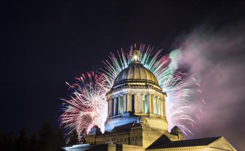 A photo of the Legislative Building with fireworks from Capital Lakefair, July 2016.