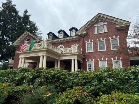 Governor's Mansion in the fall, a red-brick Georgian period building.