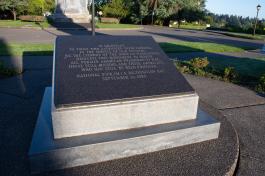 The Prisoners of War/Missing in Action Memorial, made of an engraved marble sheet set on a granite slab, sits on a stone pathway near the intersection of the North and South Diagonals on Capitol Campus.