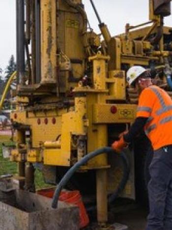 GeoTechnicians peform drilling for soil samples