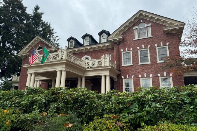 Governor's Mansion in the fall, a red-brick Georgian period building.